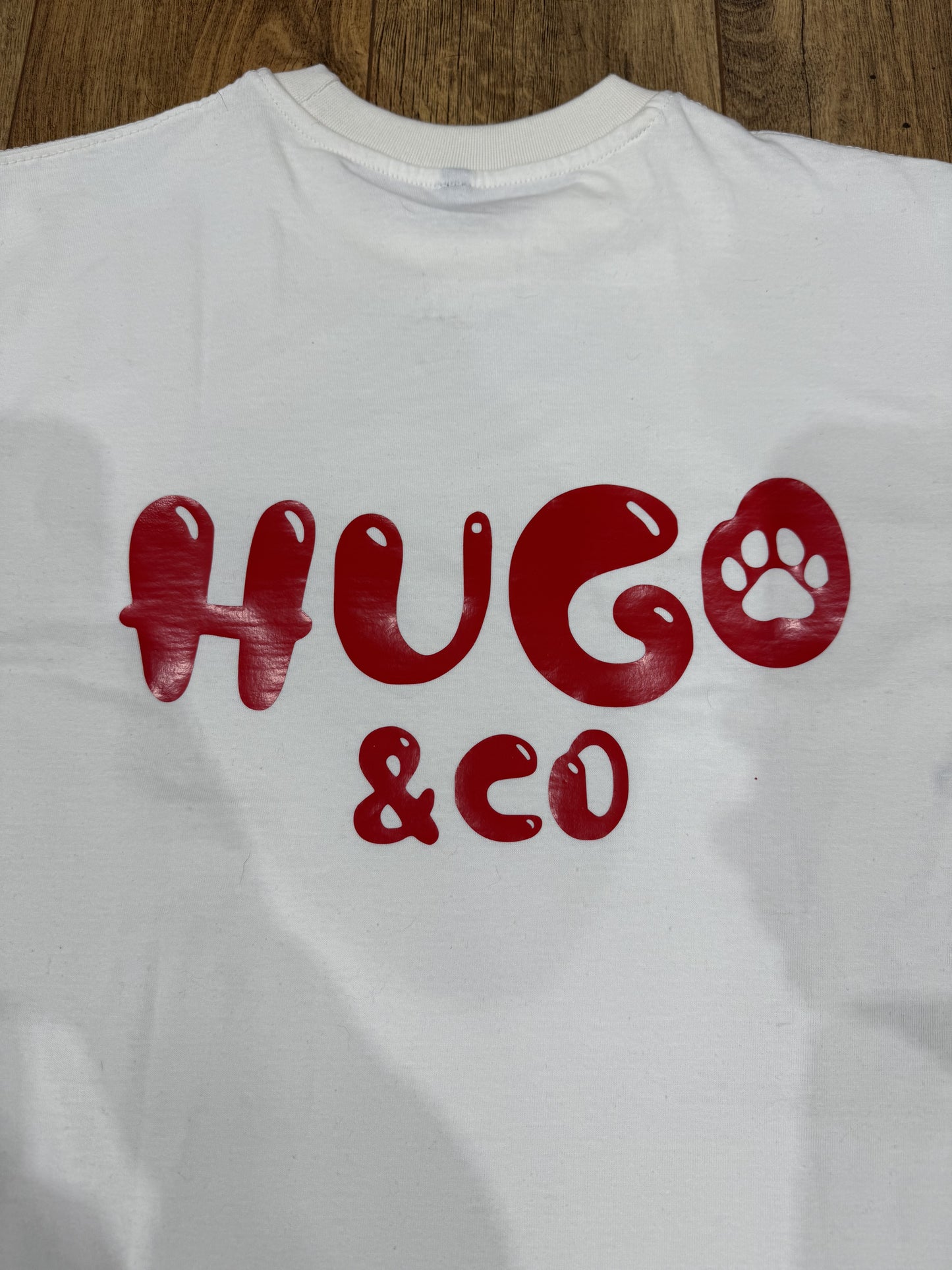 Off-white T-shirt withPaw print logo